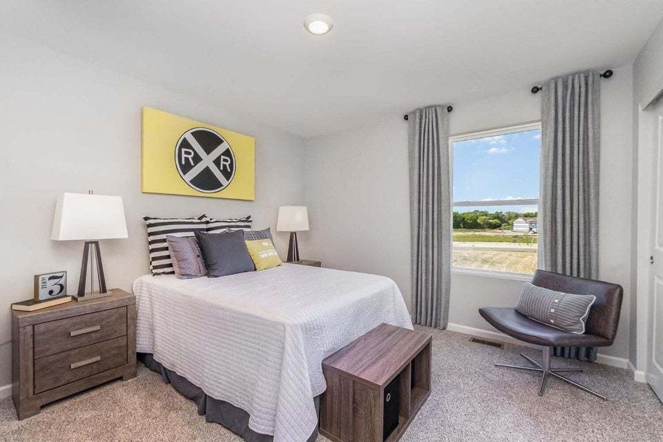 615 Ensign Place Hebron, IN 46341 - Photo 23 of 29 a bedroom with a bed and a window