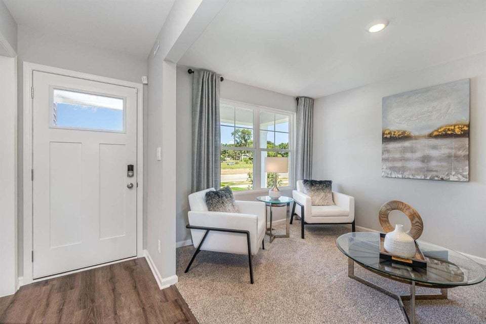 615 Ensign Place Hebron, IN 46341 - Photo 3 of 29 a living room with furniture and a window