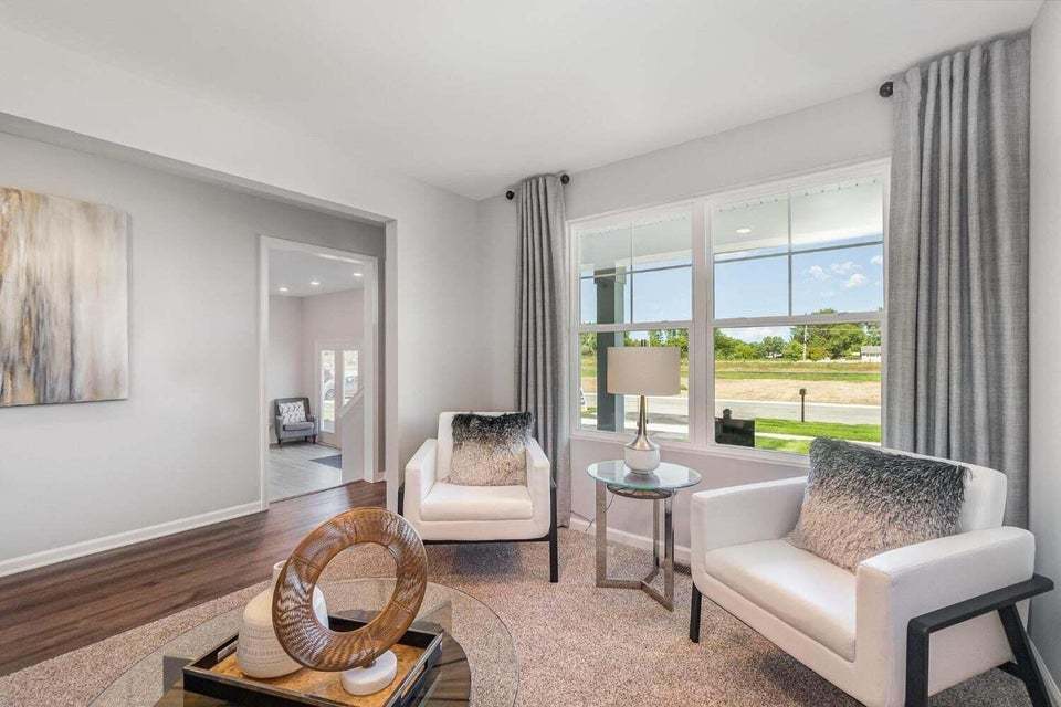 615 Ensign Place Hebron, IN 46341 - Photo 6 of 29 a living room with furniture and a large window