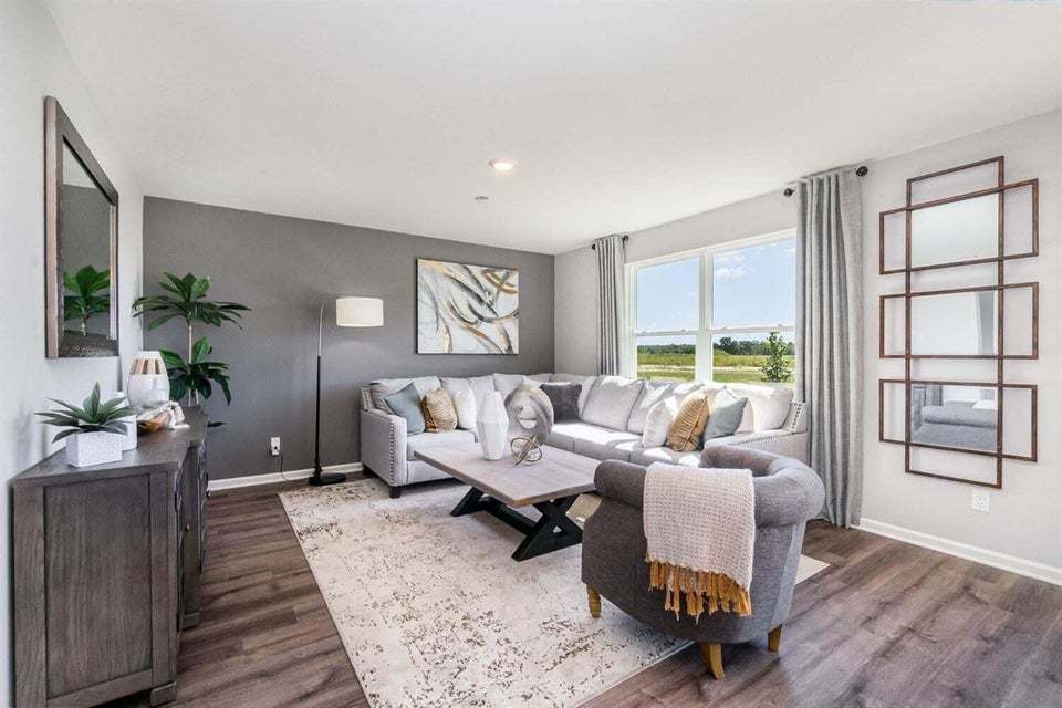 615 Ensign Place Hebron, IN 46341 - Photo 7 of 29 a living room with furniture and wooden floor