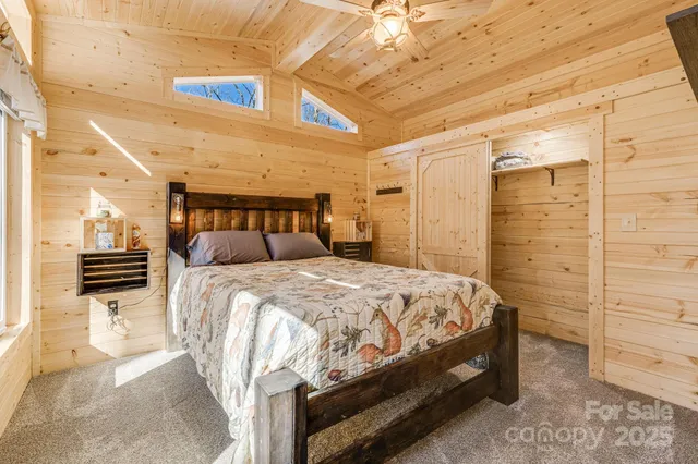 a bedroom with a bed and a walk in closet