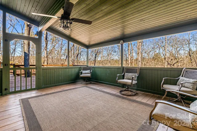 a backyard of a house with sofas