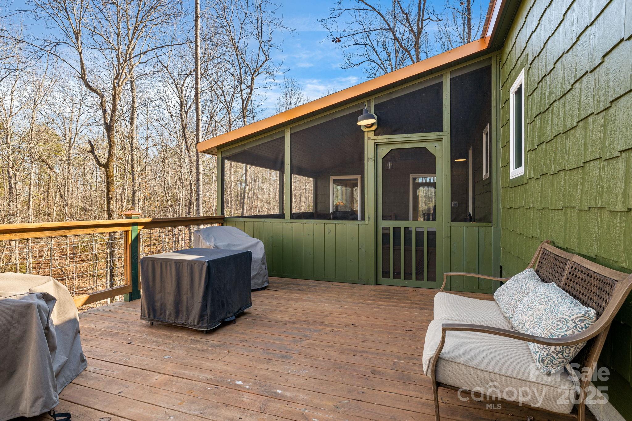 81 Delind Drive Mill Spring, NC 28756 - Photo 31 of 40 a view of a chair and tables front of the house