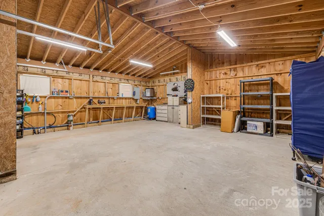 a view of a garage room with an empty space