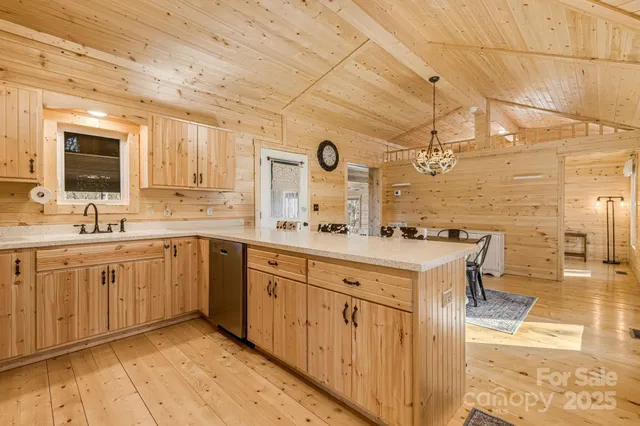 a spacious bathroom with a sink double vanity and a mirror