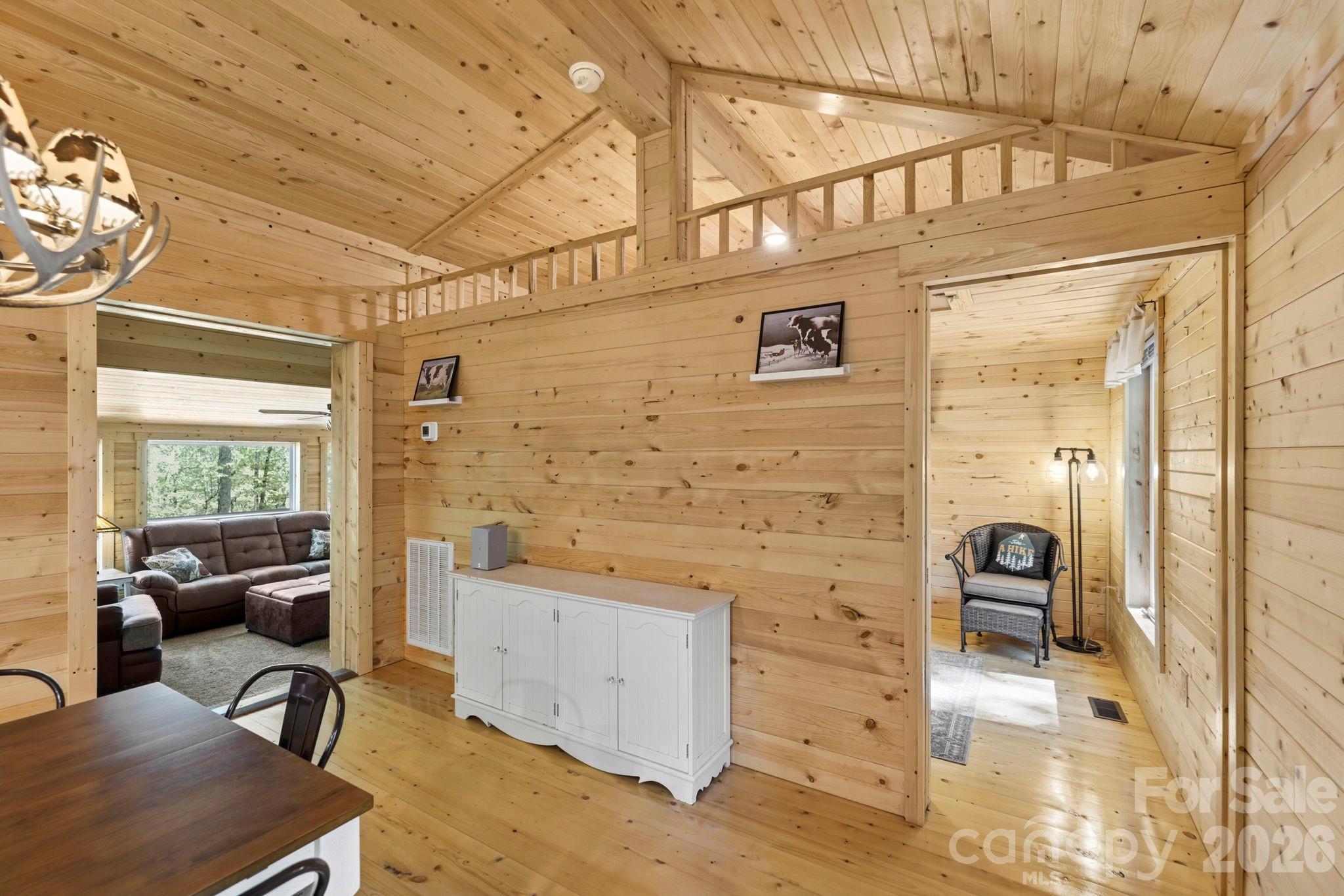 81 Delind Drive Mill Spring, NC 28756 - Photo 10 of 40 a view of a hallway with seating area