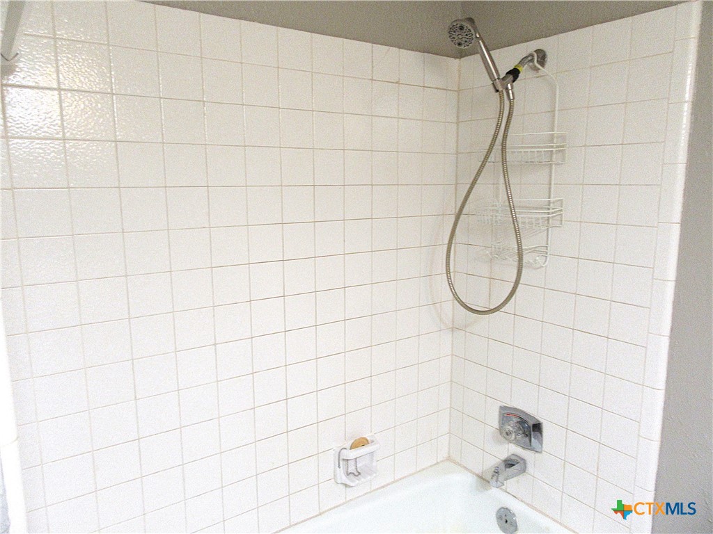 4113 Fox Trail Temple, TX 76504 - Photo 14 of 30 a bathroom with a shower
