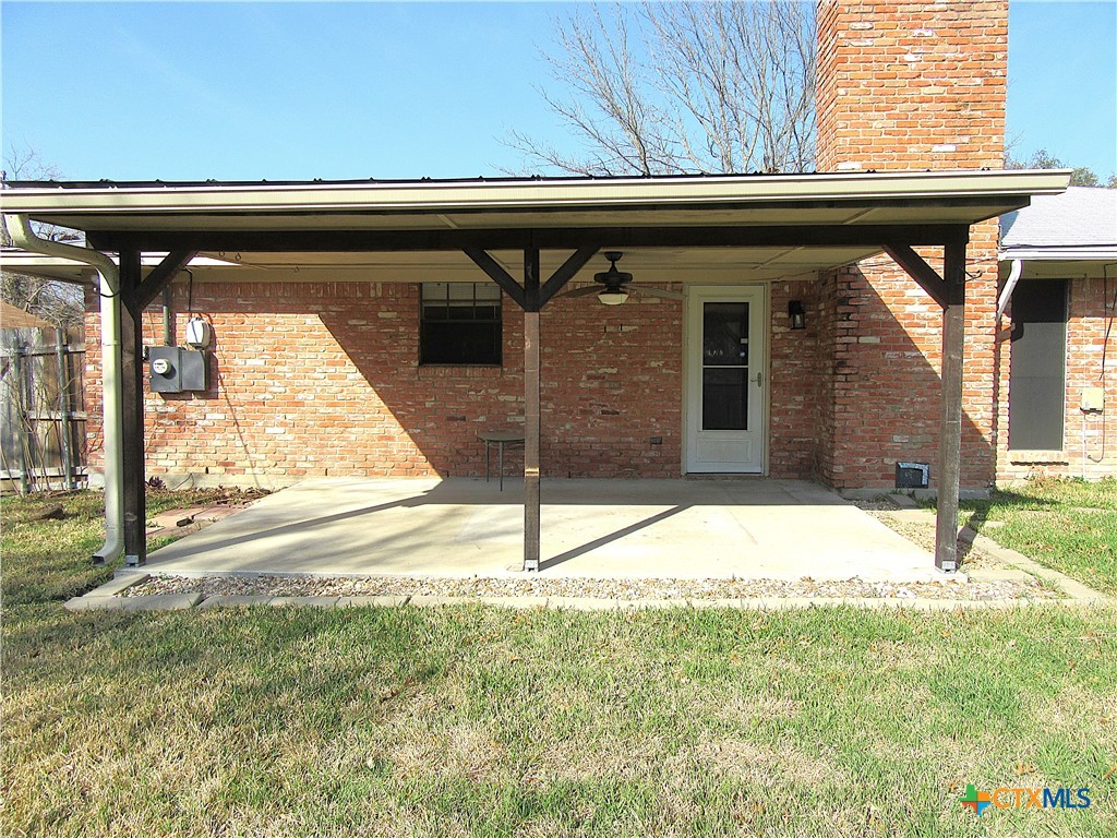 4113 Fox Trail Temple, TX 76504 - Photo 24 of 30 a backyard of a house with a yard and outdoor seating