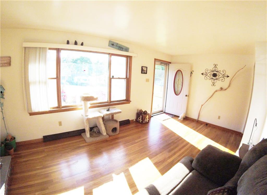 321 Concord Circle Road Beaver Falls, PA 15010 - Photo 5 of 25 The oversized picture window lets the natural light stream in - highlighting this welcoming room...