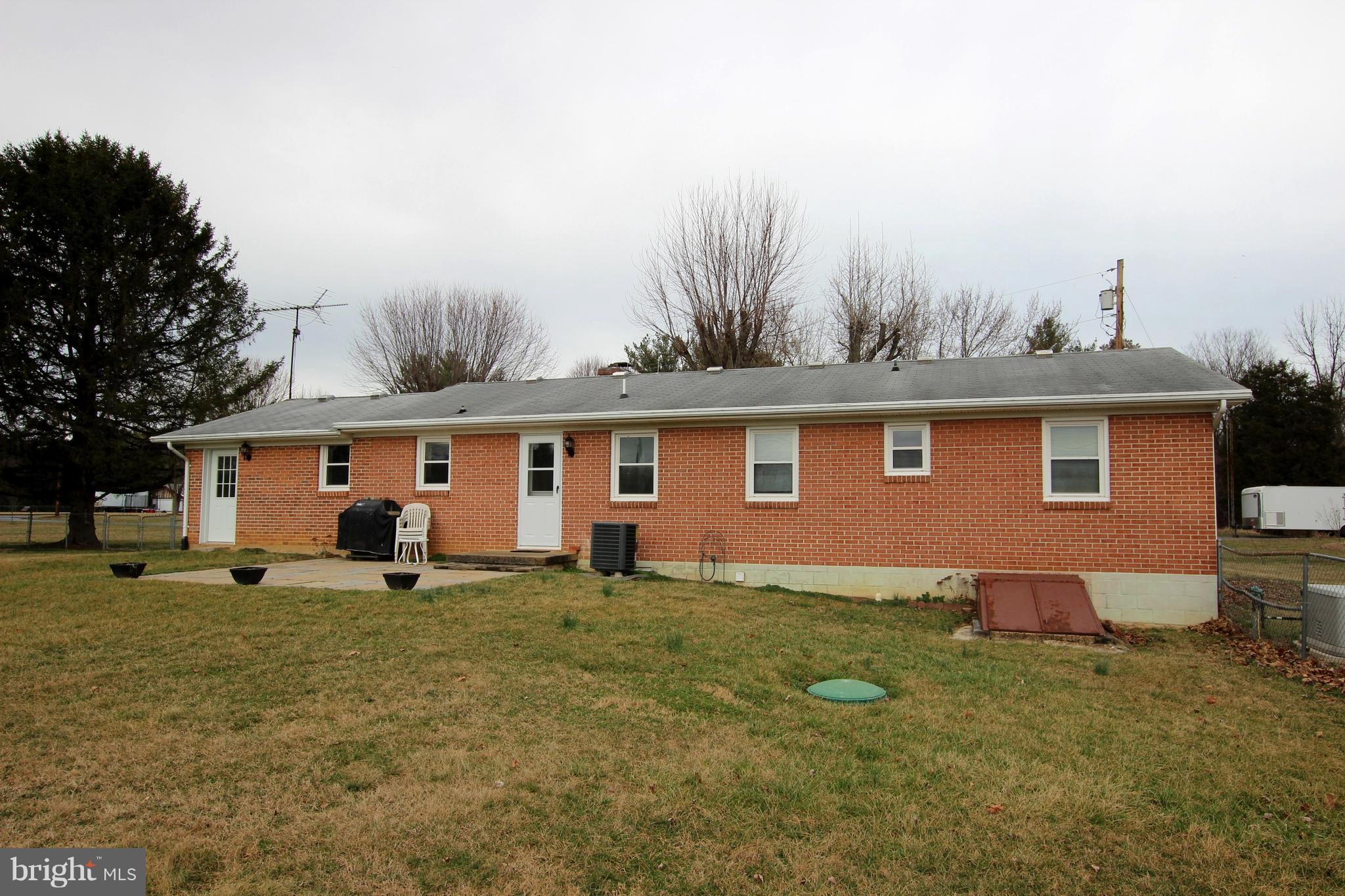 48 Apex Circle Ranson, WV 25438 - Photo 21 of 24 a view of a yard in front of a house with large tree