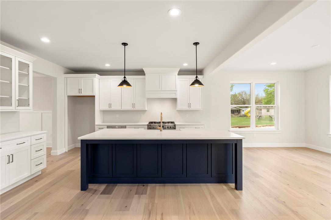 Hottle Road Quakertown, PA 18951 - Photo 13 of 59 Hardwood floors and a grand central island anchor this open-concept kitchen.