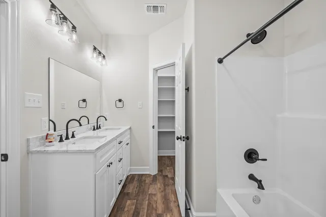 a view of an empty walk in closet