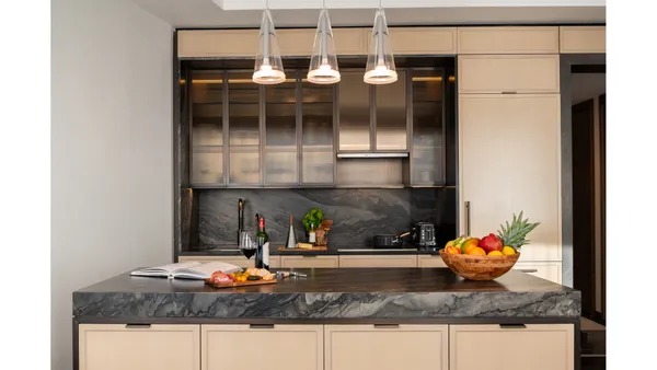 a bathroom with a window and a white door