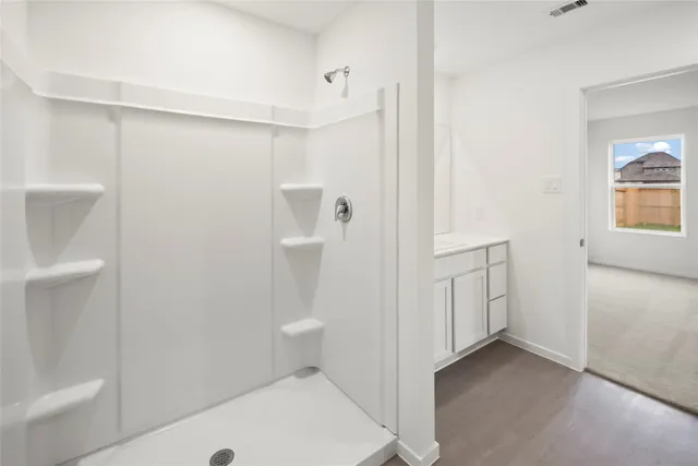 a bathroom view with a shower