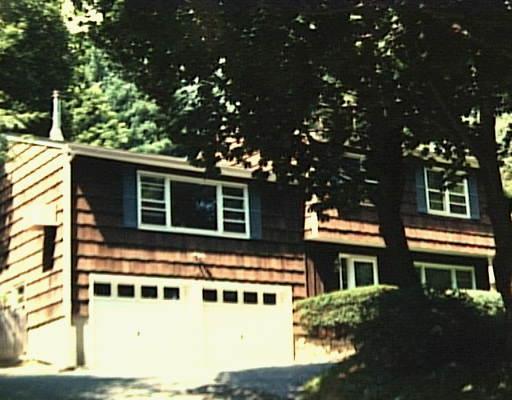 319 Wilton Road East Ridgefield, CT 06877 - Photo 1 of 1 a view of a large building with a tree in front