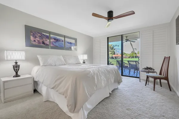 a bedroom with a bed and a cabinets
