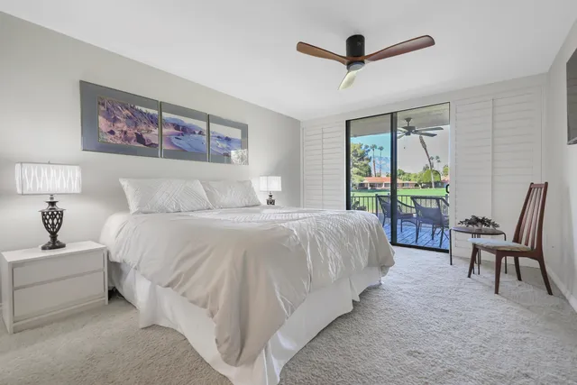 a bedroom with a bed and a cabinets