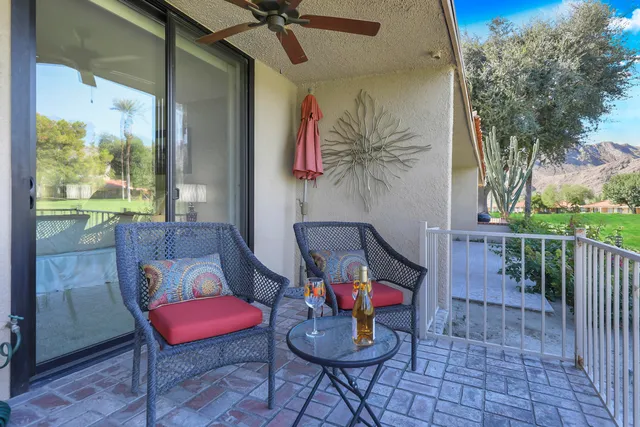 a view of a porch with furniture