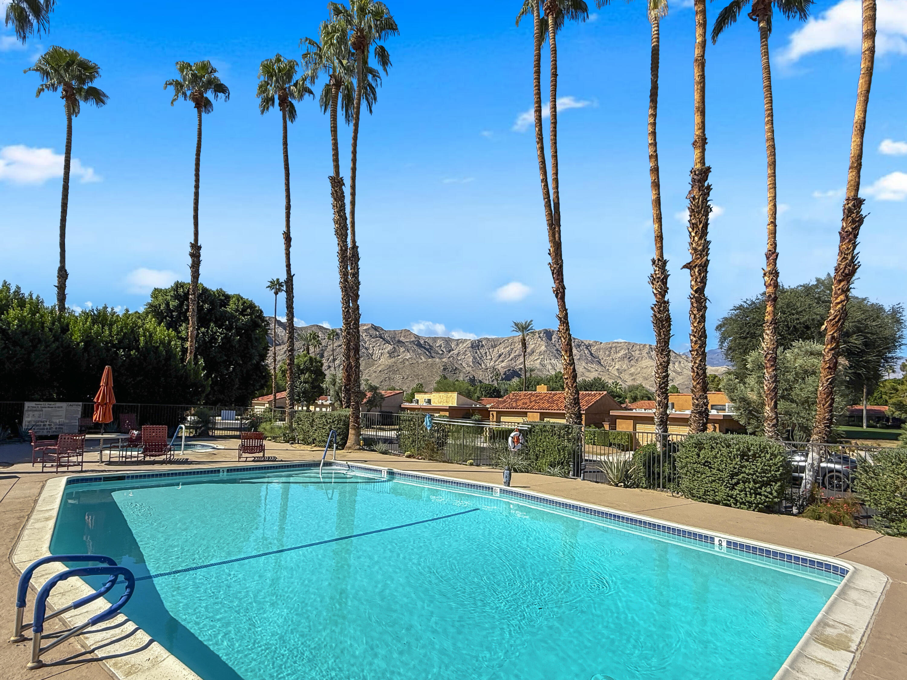 48 Palma Drive Rancho Mirage, CA 92270 - Photo 28 of 52 a view of a lake with chairs