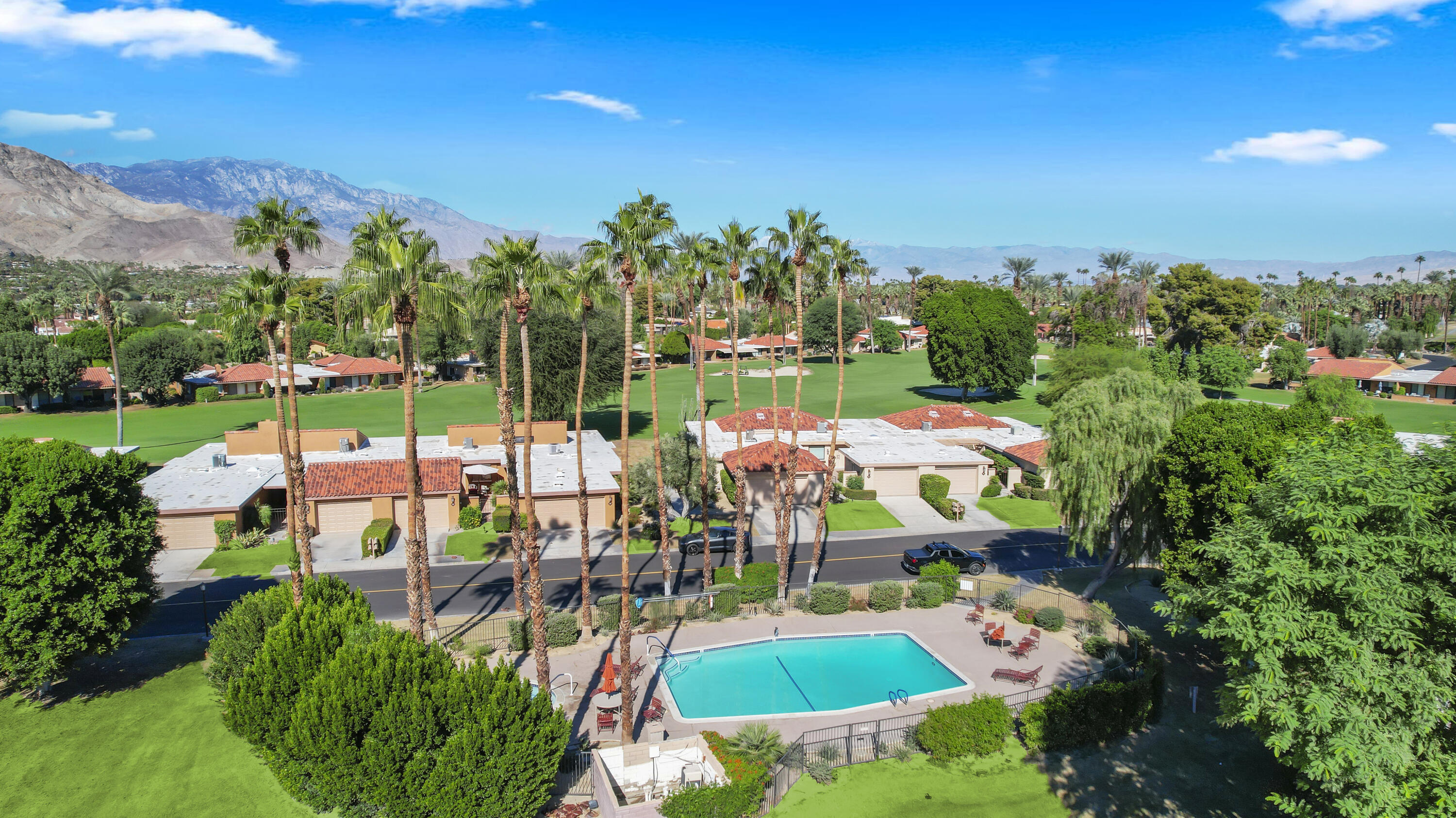 48 Palma Drive Rancho Mirage, CA 92270 - Photo 31 of 52 an outdoor space with seating area and lake view