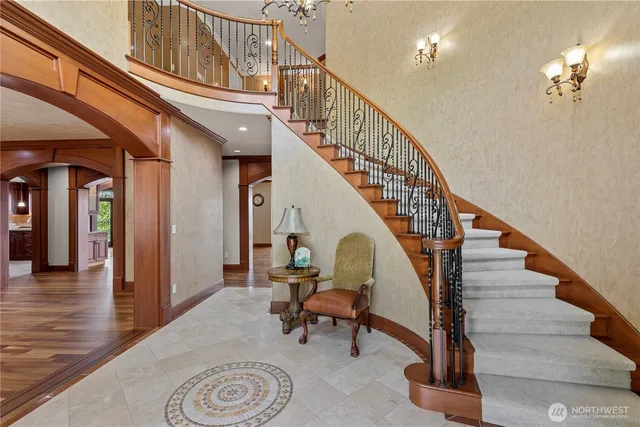 a view of entryway and hall with dining room