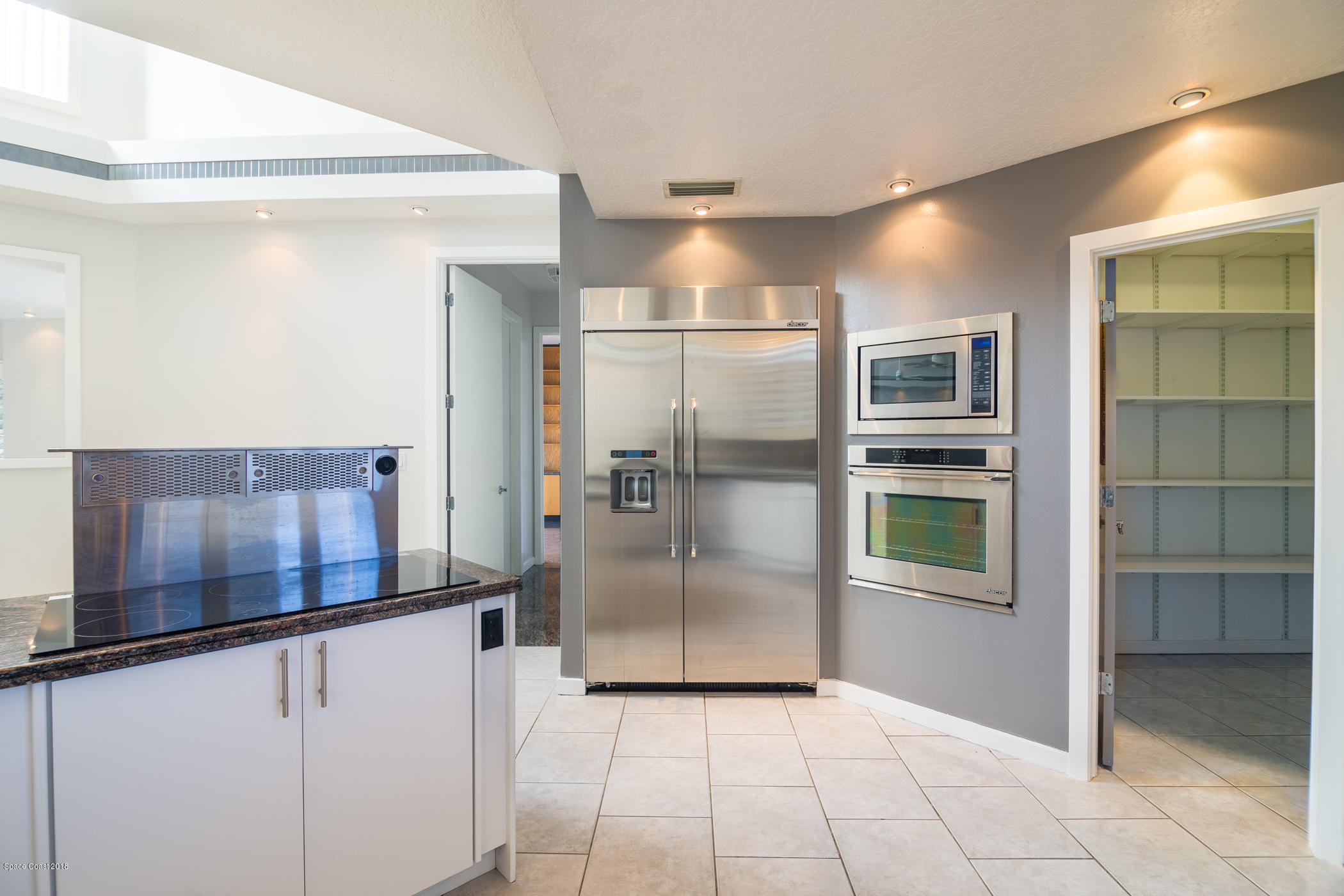 3081 Rio Baya North Melbourne, FL 32903 - Photo 15 of 31 a view of a refrigerator in a kitchen