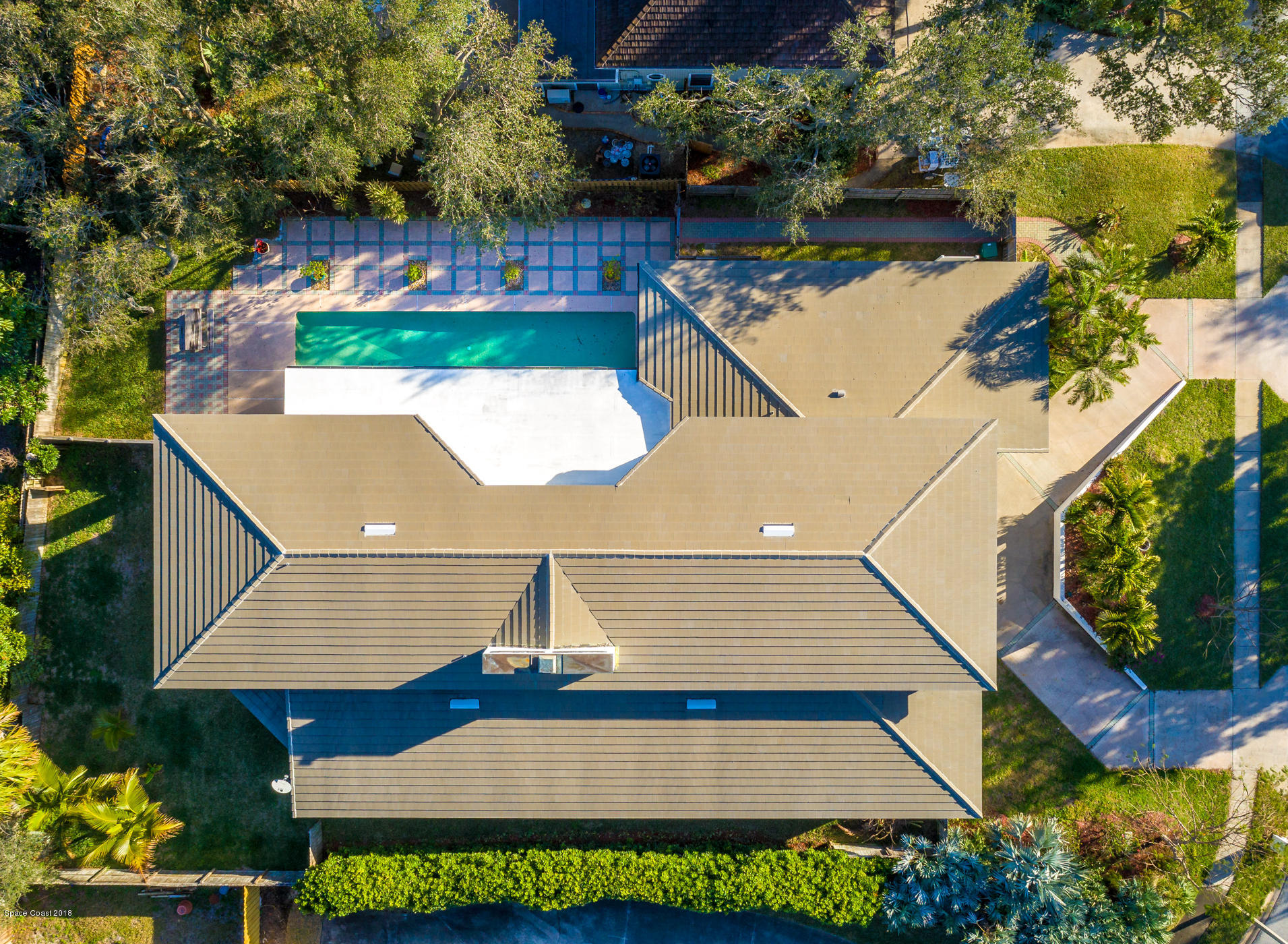 3081 Rio Baya North Melbourne, FL 32903 - Photo 3 of 31 an aerial view of a house with a garden