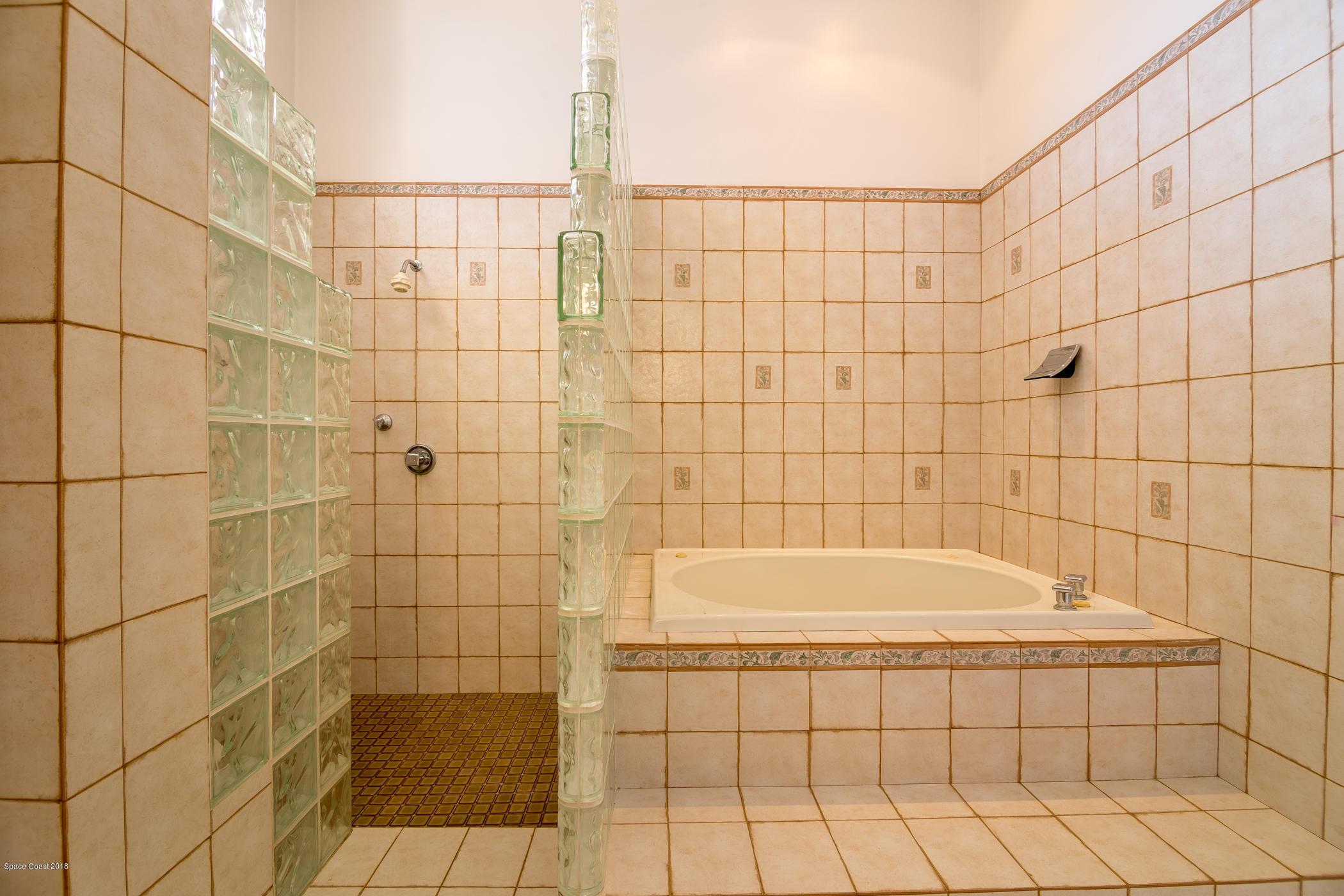 3081 Rio Baya North Melbourne, FL 32903 - Photo 23 of 31 a bathroom with a bathtub and shower