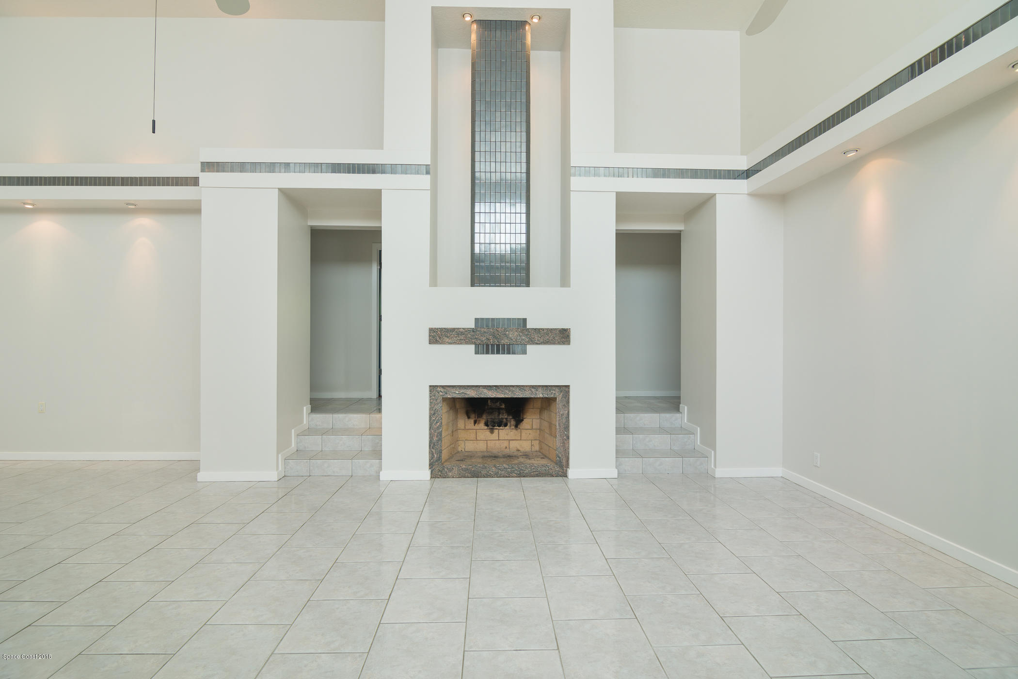 3081 Rio Baya North Melbourne, FL 32903 - Photo 8 of 31 a view of a livingroom with a fireplace