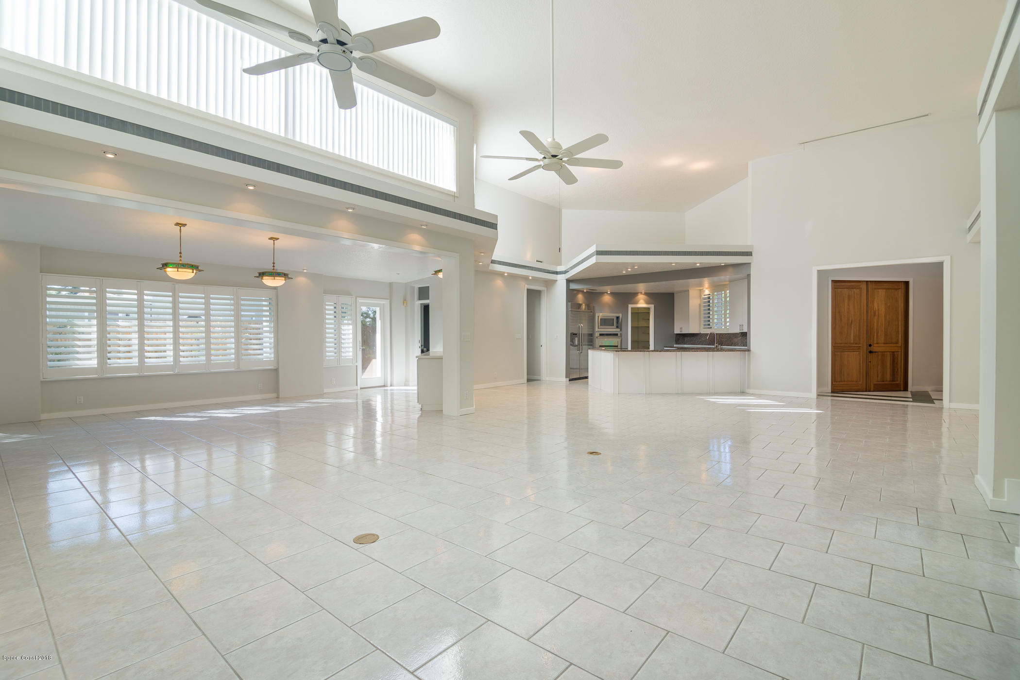 3081 Rio Baya North Melbourne, FL 32903 - Photo 9 of 31 a view of an entryway with a chandelier fan