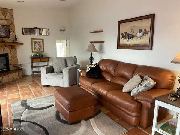 a living room with furniture and a couch