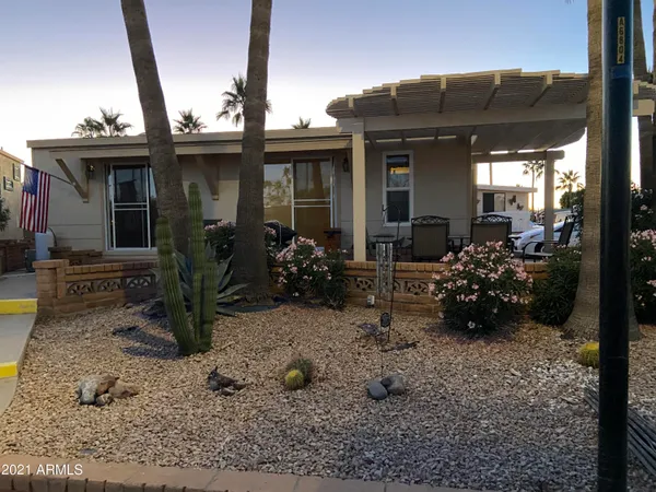 a view of a building with sitting area