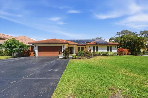 $820,000 | 10003 Northwest 53rd Court, Coral Springs, FL 33076