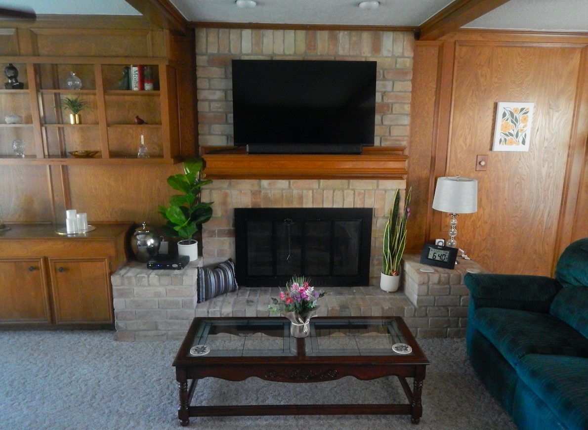 5219 Glenmere Lane Spring, TX 77379 - Photo 15 of 36 a living room with furniture and a fireplace