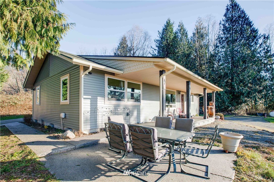 6902 Goodwin Road Everson, WA 98247 - Photo 7 of 39 a view of a house with backyard and sitting area