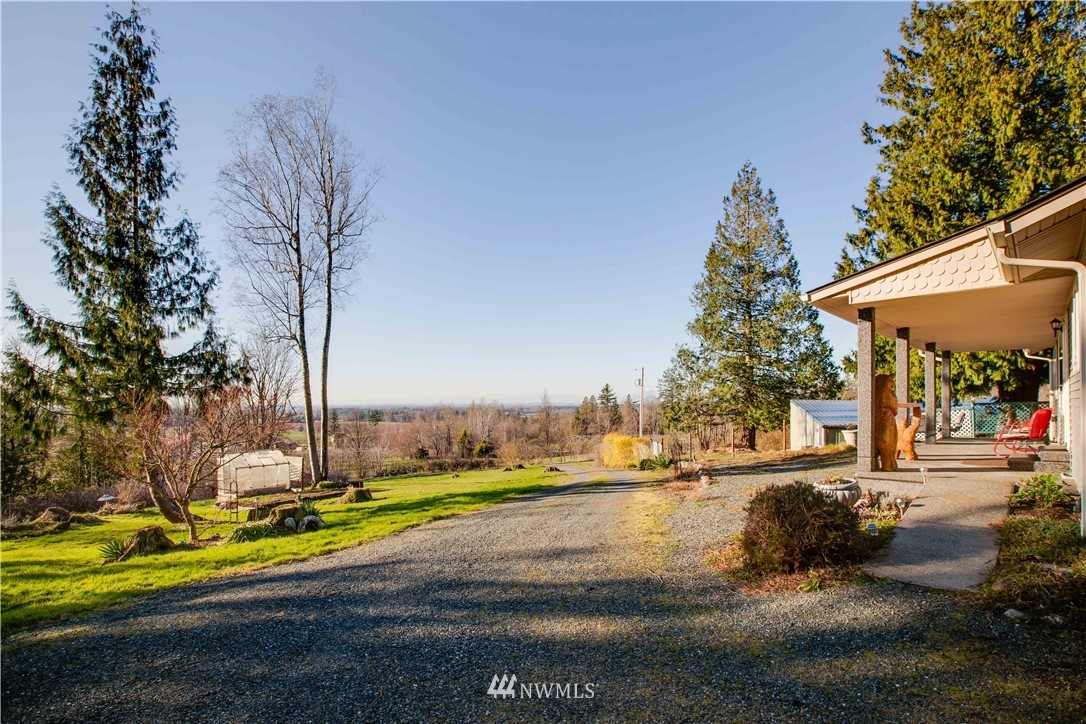6902 Goodwin Road Everson, WA 98247 - Photo 9 of 39 a view of a street with houses