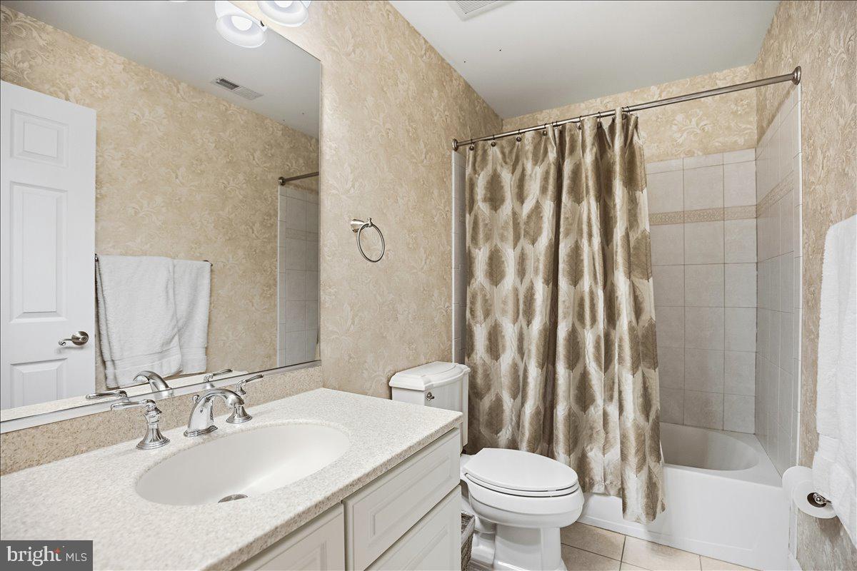 4100 Hidden Creek Road Port Republic, MD 20676 - Photo 62 of 99 Bathroom 2 with tiled surround and flooring