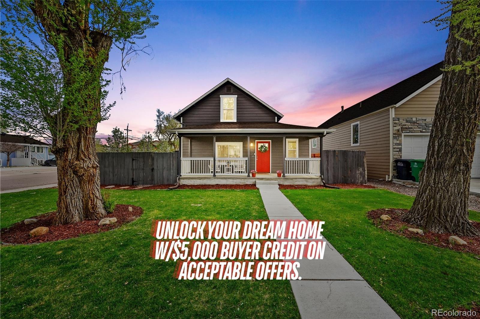 800 South Krameria Street Denver, CO 80224 - Photo 1 of 32 a front view of a house with garden