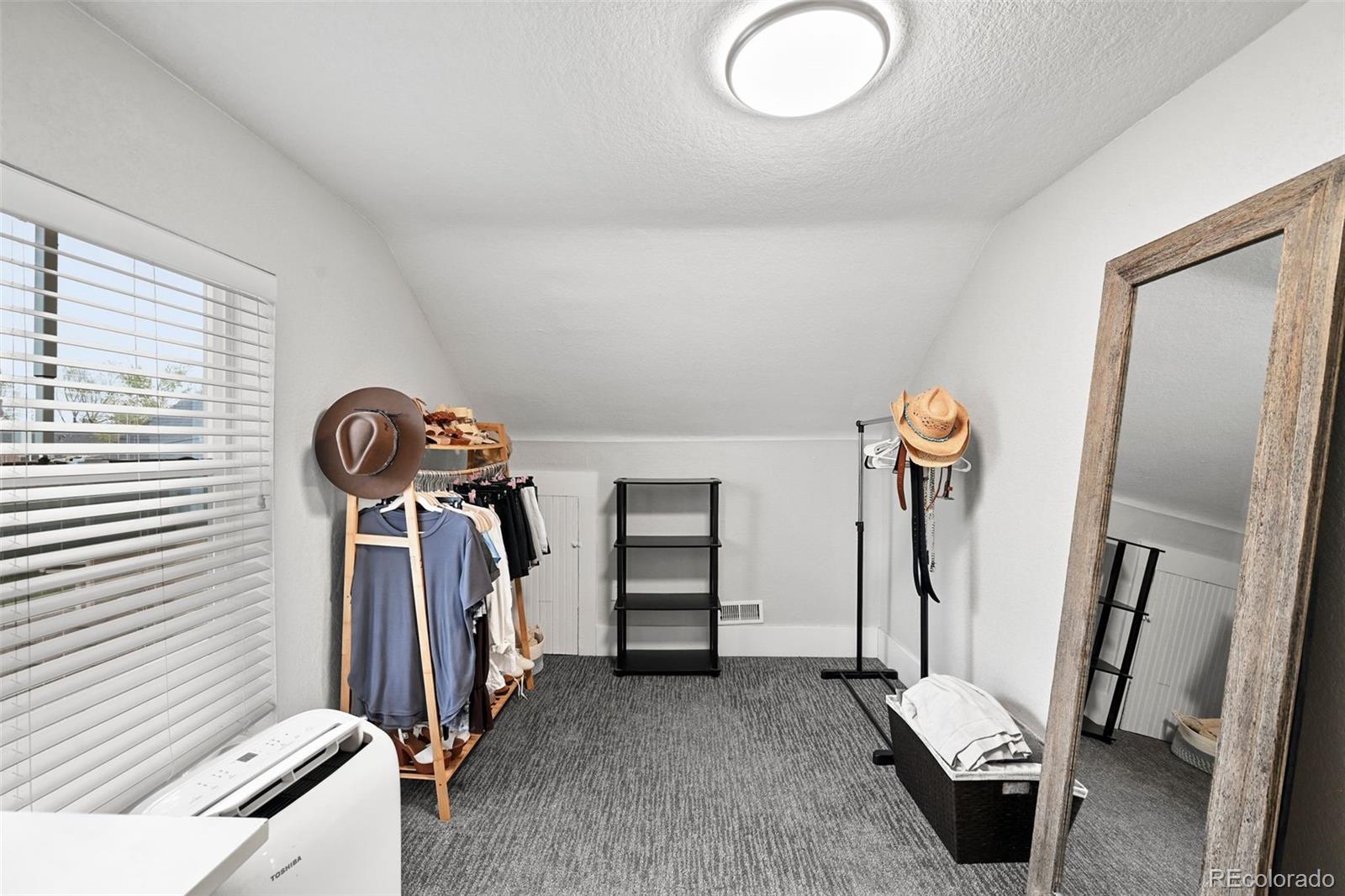 800 South Krameria Street Denver, CO 80224 - Photo 15 of 32 a view of a room with gym equipment