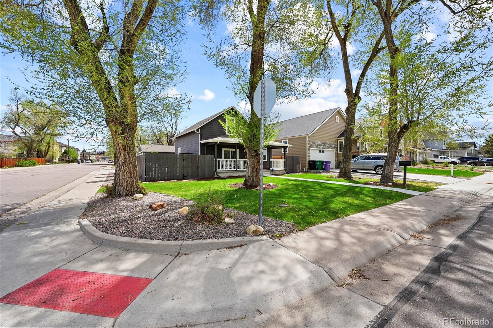 800 South Krameria Street Denver, CO 80224 - Photo 23 of 32 a view of a house with a yard