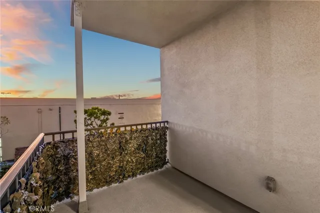 an empty room with a ceiling fan and a window