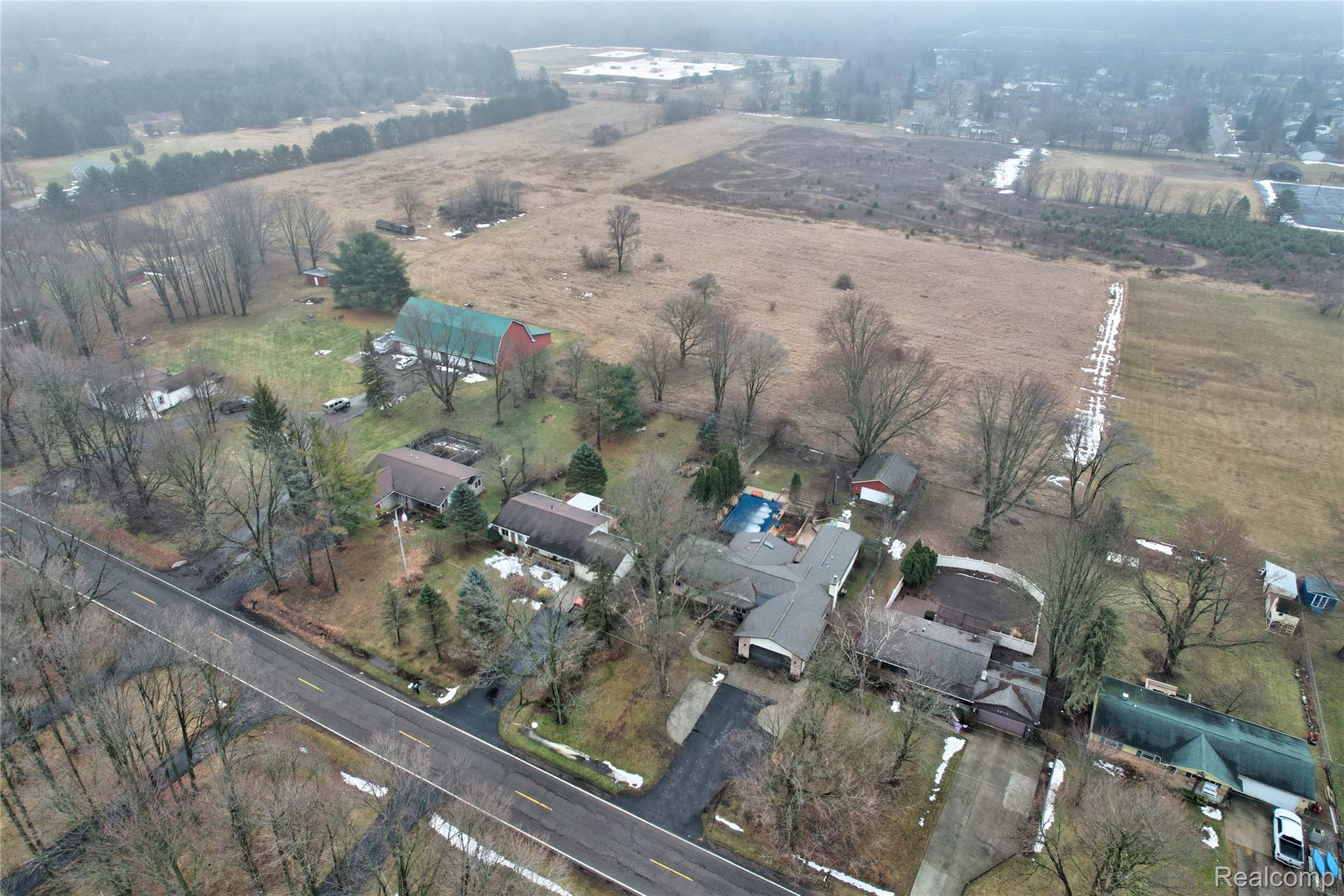 6076 East Carpenter Road Flint, MI 48506 - Photo 57 of 67 Aerial overview of property's location with rural landscape
