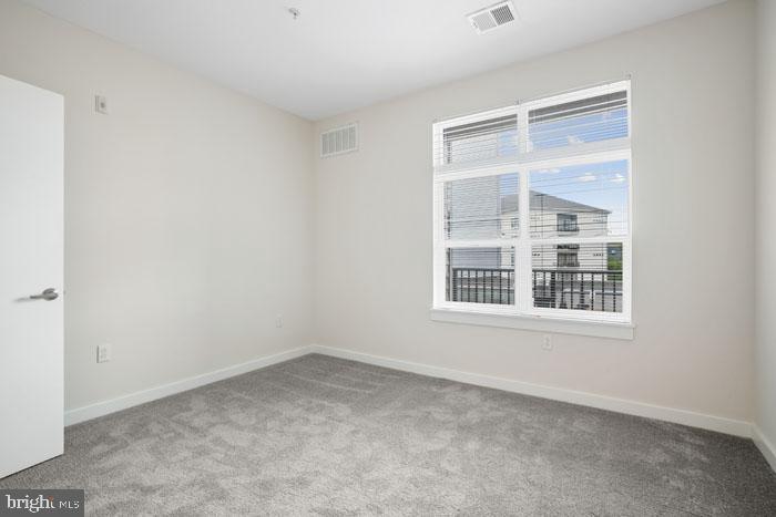 131 Bridge Street, Unit 2B22402 Phoenixville, PA 19460 - Photo 85 of 104 a view of an empty room with a window
