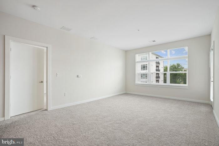 131 Bridge Street, Unit 2B22402 Phoenixville, PA 19460 - Photo 95 of 104 a view of an empty room with a window
