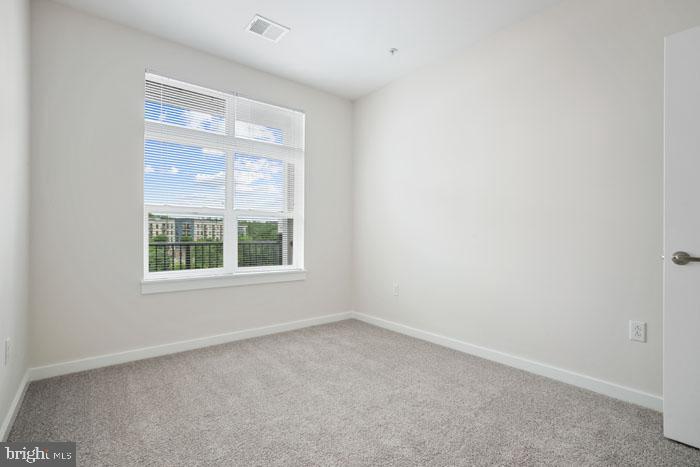 131 Bridge Street, Unit 2B22402 Phoenixville, PA 19460 - Photo 98 of 104 an empty room with a window