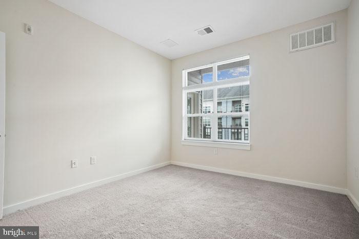 131 Bridge Street, Unit 2B22402 Phoenixville, PA 19460 - Photo 100 of 104 a view of an empty room with a window