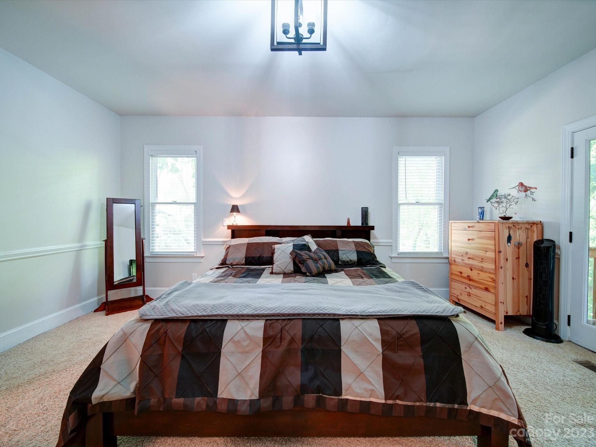 536 Beacon Knoll Lane Fort Mill, SC 29708 - Photo 16 of 45 a bedroom with a bed and window