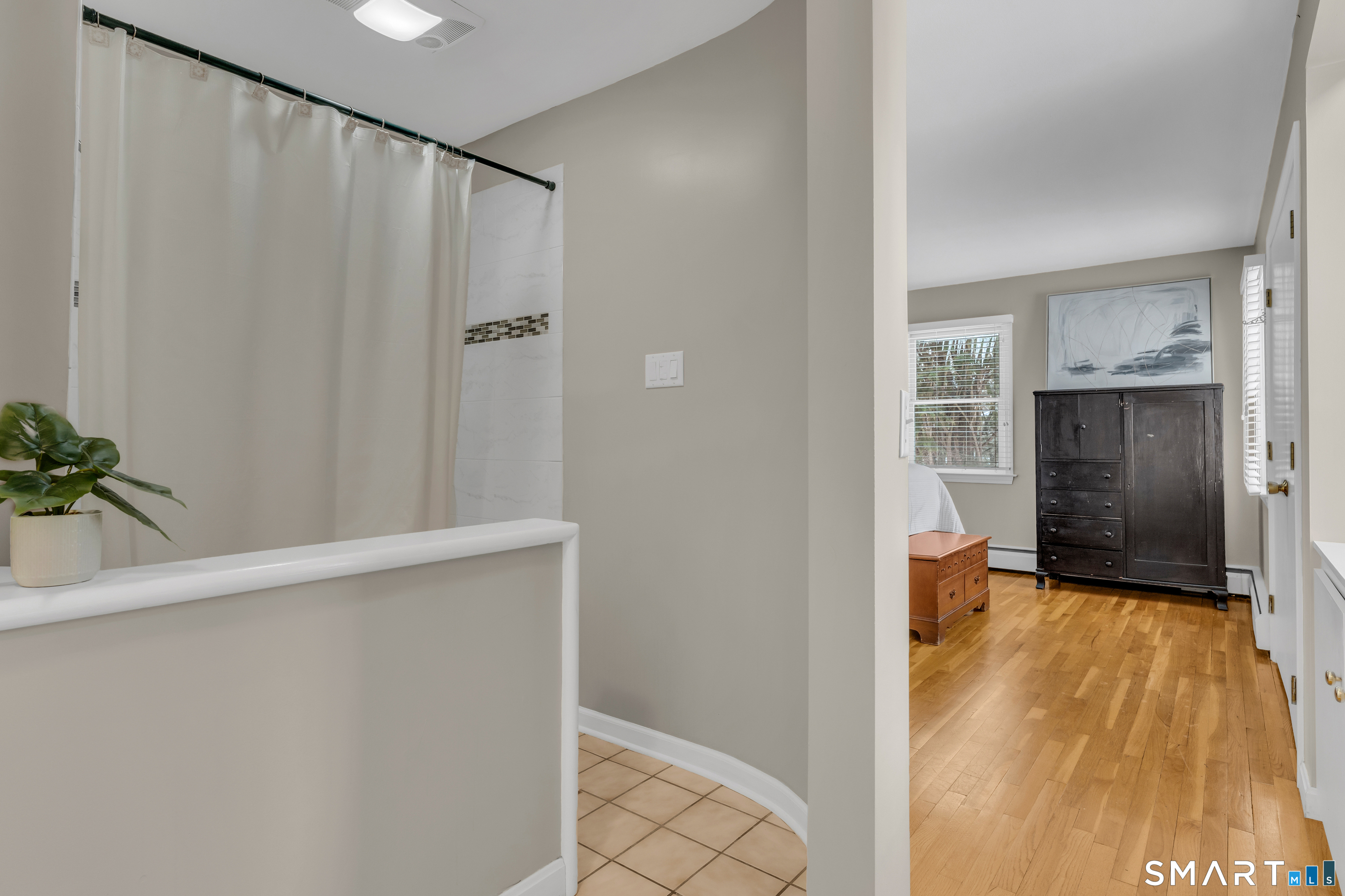 40 Hull Road Madison, CT 06443 - Photo 29 of 40 Jacuzzi tub and shower with knee wall for privacy.