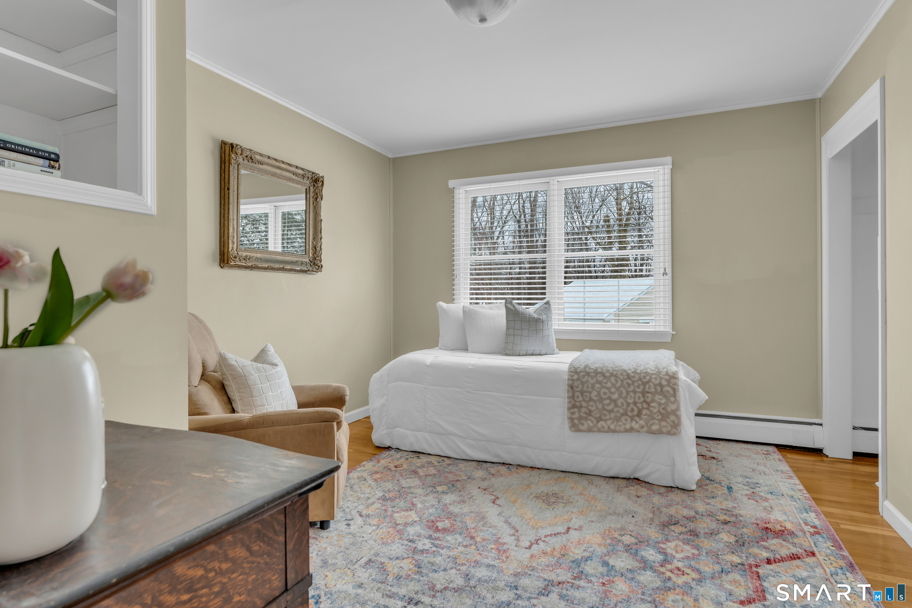 40 Hull Road Madison, CT 06443 - Photo 31 of 40 Second floor bedroom with a built-in bookshelf.
