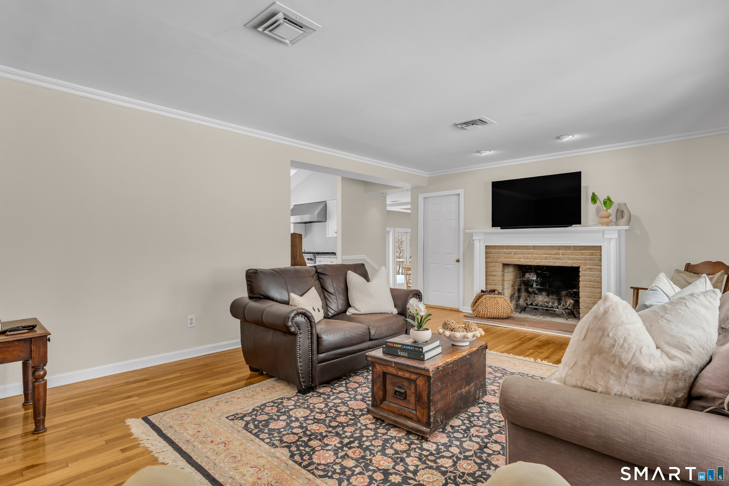 40 Hull Road Madison, CT 06443 - Photo 8 of 40 The cozy wood-burning fireplace brings the warmth!